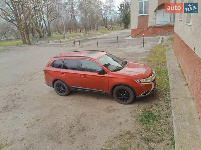 Красный Мицубиси Аутлендер, объемом двигателя 2.36 л и пробегом 60 тыс. км за 15500 $, фото 11 на Automoto.ua