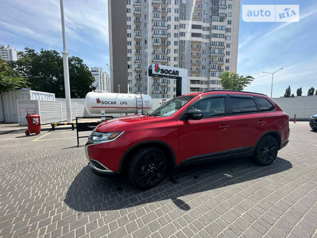 Красный Мицубиси Аутлендер, объемом двигателя 2.4 л и пробегом 107 тыс. км за 16900 $, фото 8 на Automoto.ua