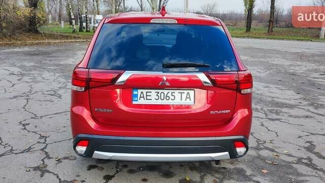Красный Мицубиси Аутлендер, объемом двигателя 2.36 л и пробегом 80 тыс. км за 16500 $, фото 5 на Automoto.ua