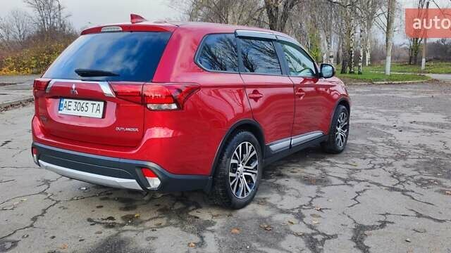 Красный Мицубиси Аутлендер, объемом двигателя 2.36 л и пробегом 80 тыс. км за 16500 $, фото 4 на Automoto.ua