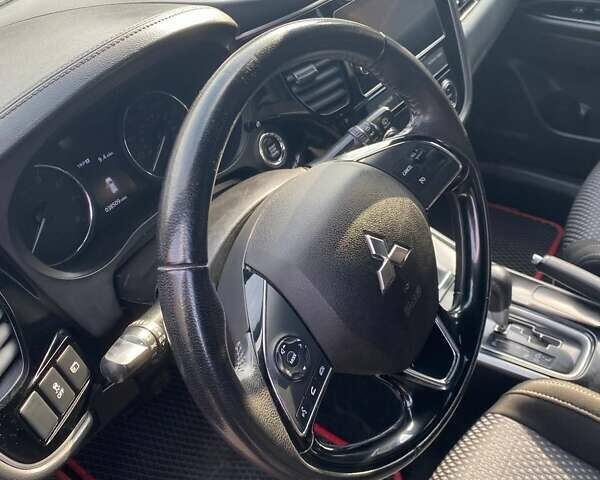 Красный Мицубиси Аутлендер, объемом двигателя 2.36 л и пробегом 60 тыс. км за 15500 $, фото 27 на Automoto.ua