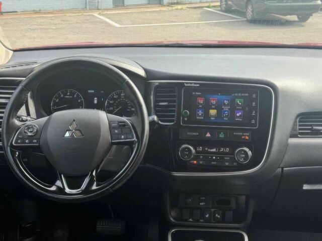 Красный Мицубиси Аутлендер, объемом двигателя 2.4 л и пробегом 51 тыс. км за 8900 $, фото 7 на Automoto.ua