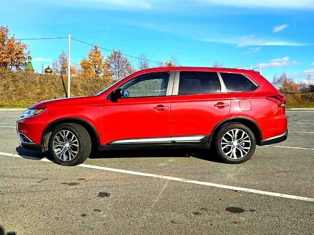 Красный Мицубиси Аутлендер, объемом двигателя 2.4 л и пробегом 174 тыс. км за 14300 $, фото 11 на Automoto.ua