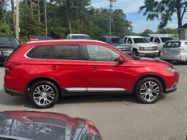 Красный Мицубиси Аутлендер, объемом двигателя 2.4 л и пробегом 51 тыс. км за 8900 $, фото 4 на Automoto.ua