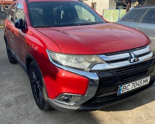 Красный Мицубиси Аутлендер, объемом двигателя 2.36 л и пробегом 60 тыс. км за 15500 $, фото 6 на Automoto.ua