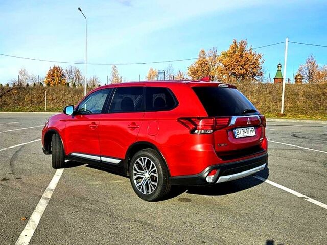 Красный Мицубиси Аутлендер, объемом двигателя 2.4 л и пробегом 174 тыс. км за 14300 $, фото 12 на Automoto.ua