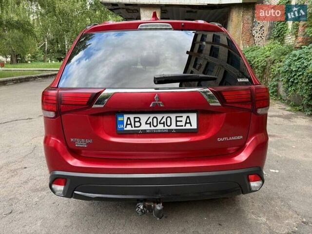 Червоний Міцубісі Аутлендер, об'ємом двигуна 2.4 л та пробігом 120 тис. км за 16000 $, фото 5 на Automoto.ua