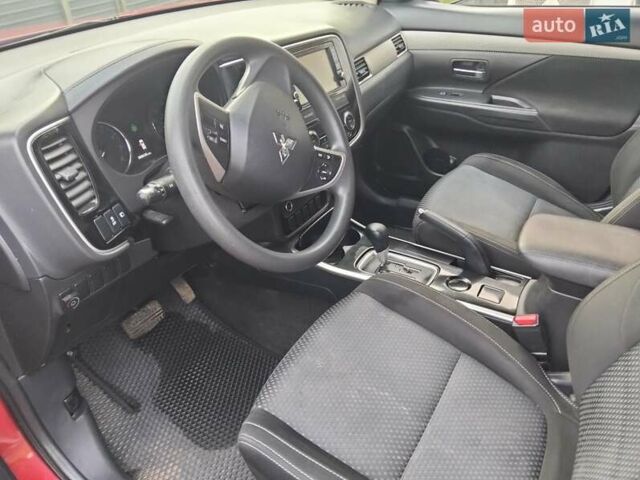 Красный Мицубиси Аутлендер, объемом двигателя 2.36 л и пробегом 110 тыс. км за 16800 $, фото 13 на Automoto.ua