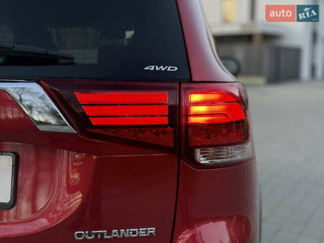 Красный Мицубиси Аутлендер, объемом двигателя 2 л и пробегом 85 тыс. км за 18900 $, фото 20 на Automoto.ua