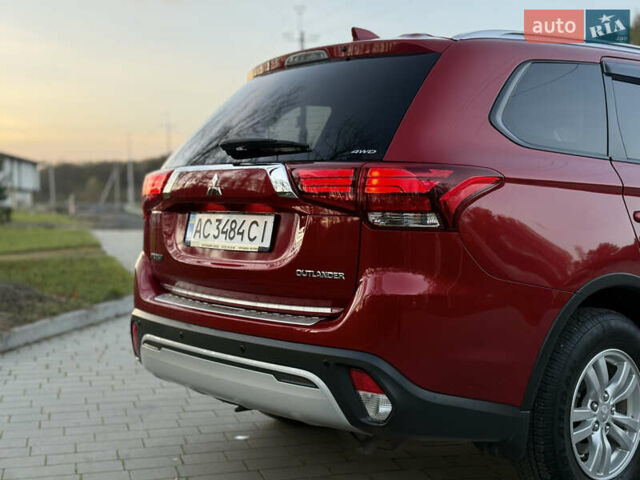 Красный Мицубиси Аутлендер, объемом двигателя 2 л и пробегом 85 тыс. км за 18900 $, фото 22 на Automoto.ua