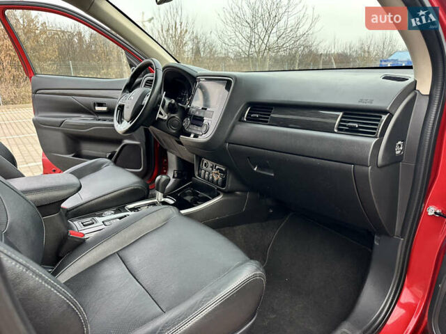 Красный Мицубиси Аутлендер, объемом двигателя 2.2 л и пробегом 118 тыс. км за 20999 $, фото 55 на Automoto.ua