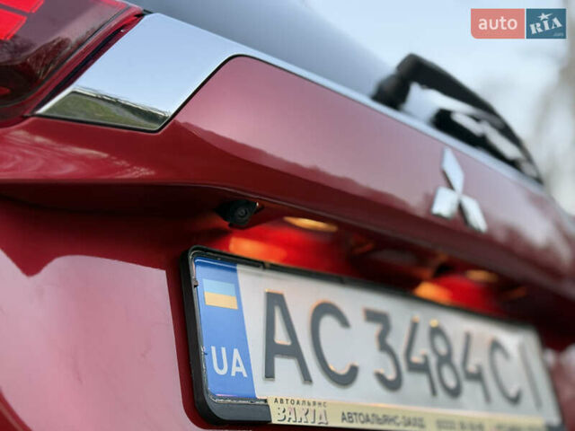 Красный Мицубиси Аутлендер, объемом двигателя 2 л и пробегом 85 тыс. км за 18900 $, фото 69 на Automoto.ua