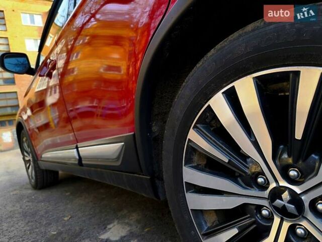 Красный Мицубиси Аутлендер, объемом двигателя 2.4 л и пробегом 125 тыс. км за 17400 $, фото 5 на Automoto.ua