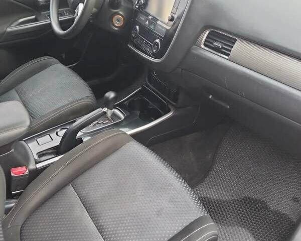 Красный Мицубиси Аутлендер, объемом двигателя 2.36 л и пробегом 110 тыс. км за 16800 $, фото 14 на Automoto.ua