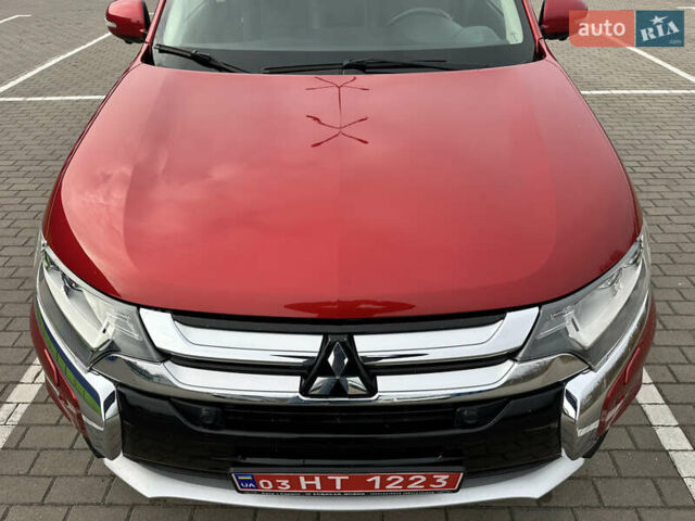 Красный Мицубиси Аутлендер, объемом двигателя 2.2 л и пробегом 118 тыс. км за 20999 $, фото 16 на Automoto.ua