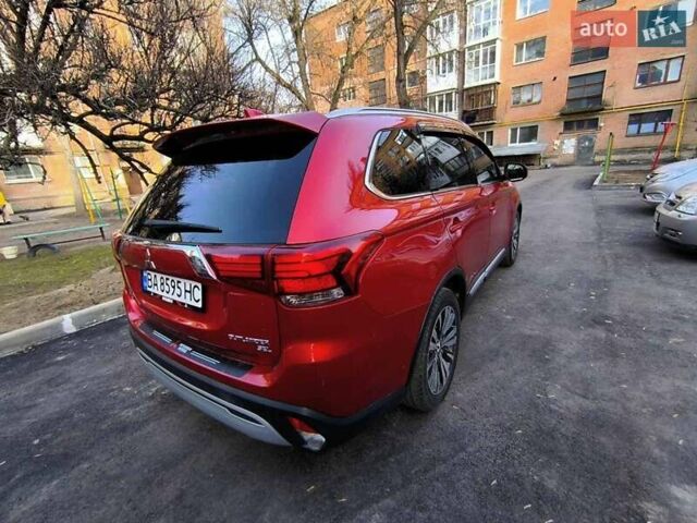 Красный Мицубиси Аутлендер, объемом двигателя 2.4 л и пробегом 125 тыс. км за 17400 $, фото 17 на Automoto.ua