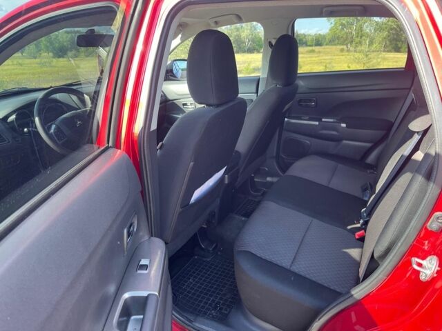 Красный Мицубиси Аутлендер, объемом двигателя 2 л и пробегом 130 тыс. км за 14300 $, фото 8 на Automoto.ua