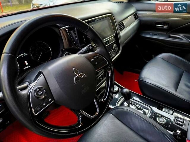 Красный Мицубиси Аутлендер, объемом двигателя 2.4 л и пробегом 125 тыс. км за 17400 $, фото 12 на Automoto.ua