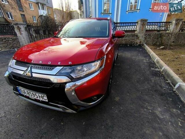 Красный Мицубиси Аутлендер, объемом двигателя 2.4 л и пробегом 125 тыс. км за 17400 $, фото 18 на Automoto.ua