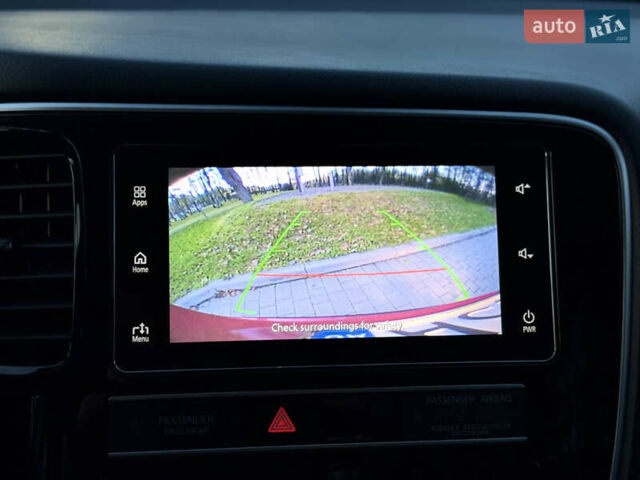 Красный Мицубиси Аутлендер, объемом двигателя 2 л и пробегом 85 тыс. км за 18900 $, фото 107 на Automoto.ua