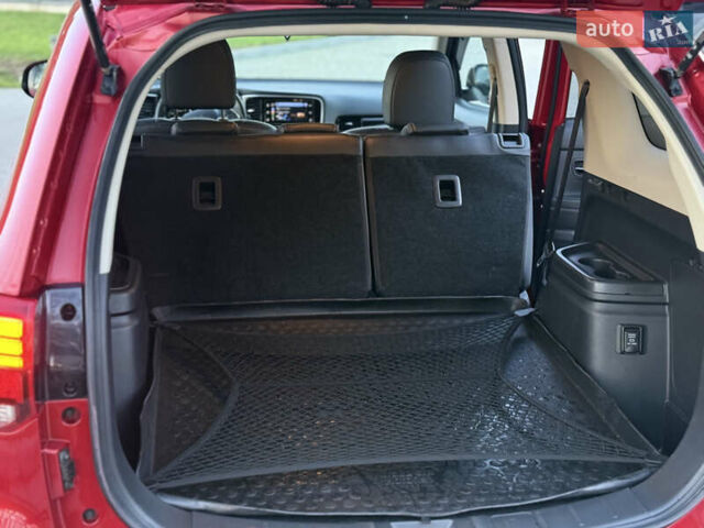 Красный Мицубиси Аутлендер, объемом двигателя 2 л и пробегом 85 тыс. км за 18900 $, фото 59 на Automoto.ua