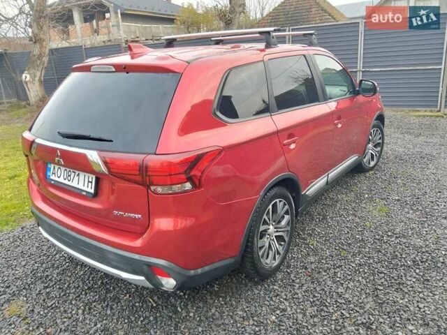 Красный Мицубиси Аутлендер, объемом двигателя 2.36 л и пробегом 110 тыс. км за 16800 $, фото 7 на Automoto.ua