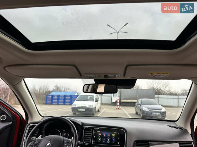 Красный Мицубиси Аутлендер, объемом двигателя 2.2 л и пробегом 118 тыс. км за 20999 $, фото 61 на Automoto.ua