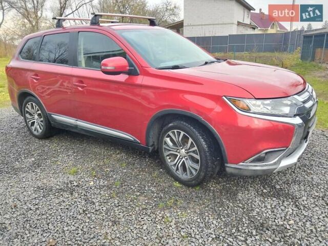 Красный Мицубиси Аутлендер, объемом двигателя 2.36 л и пробегом 110 тыс. км за 16800 $, фото 11 на Automoto.ua