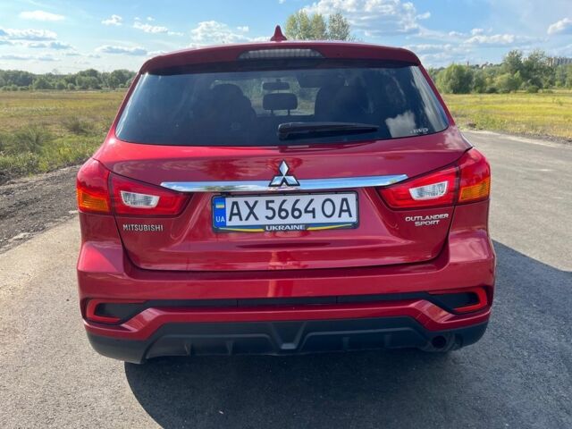 Красный Мицубиси Аутлендер, объемом двигателя 2 л и пробегом 130 тыс. км за 14300 $, фото 4 на Automoto.ua