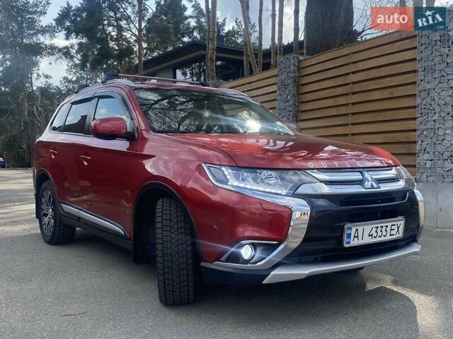 Красный Мицубиси Аутлендер, объемом двигателя 2.4 л и пробегом 75 тыс. км за 16550 $, фото 14 на Automoto.ua