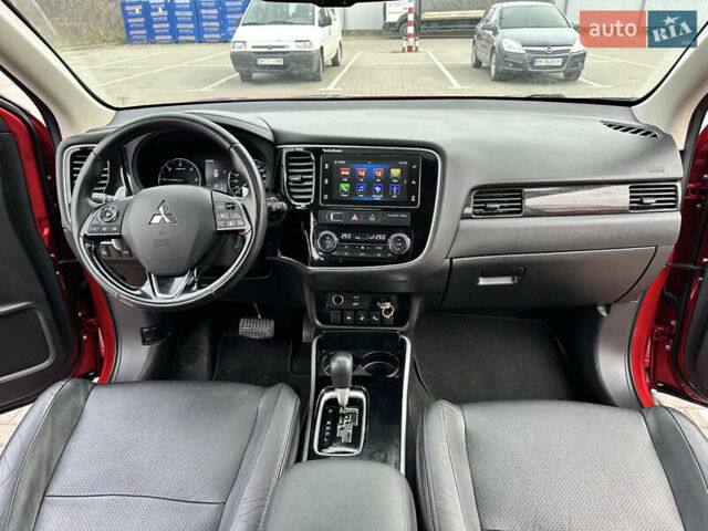 Красный Мицубиси Аутлендер, объемом двигателя 2.2 л и пробегом 118 тыс. км за 20999 $, фото 60 на Automoto.ua
