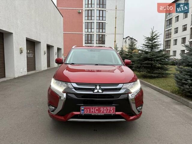 Красный Мицубиси Аутлендер, объемом двигателя 2 л и пробегом 176 тыс. км за 18900 $, фото 2 на Automoto.ua