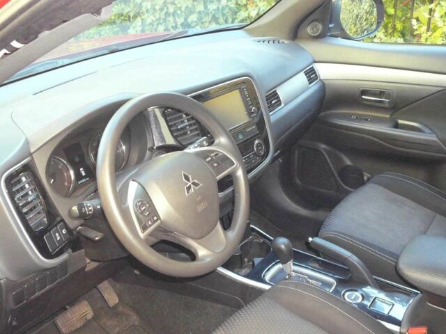 Красный Мицубиси Аутлендер, объемом двигателя 2.4 л и пробегом 117 тыс. км за 10500 $, фото 6 на Automoto.ua