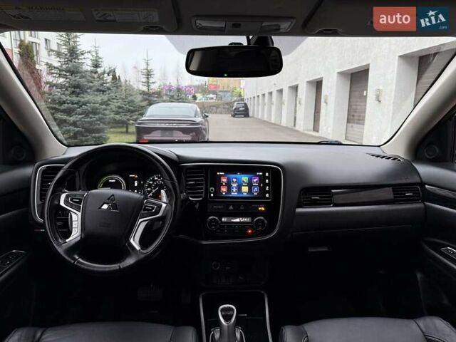 Красный Мицубиси Аутлендер, объемом двигателя 2 л и пробегом 176 тыс. км за 18900 $, фото 11 на Automoto.ua