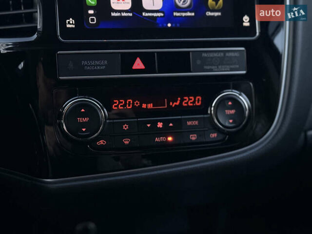 Красный Мицубиси Аутлендер, объемом двигателя 2 л и пробегом 85 тыс. км за 18900 $, фото 78 на Automoto.ua