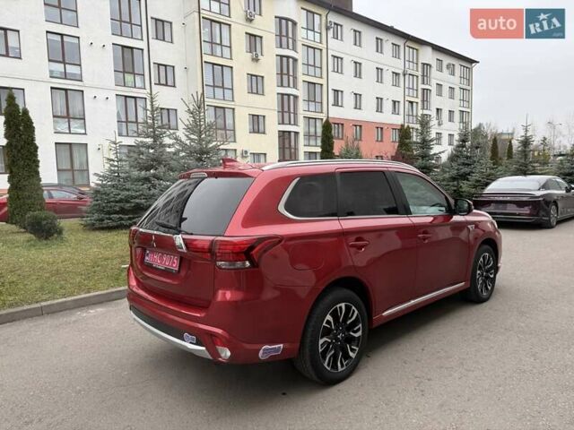 Красный Мицубиси Аутлендер, объемом двигателя 2 л и пробегом 176 тыс. км за 18900 $, фото 4 на Automoto.ua