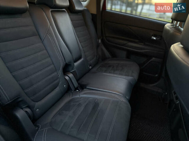 Красный Мицубиси Аутлендер, объемом двигателя 2 л и пробегом 85 тыс. км за 18900 $, фото 50 на Automoto.ua