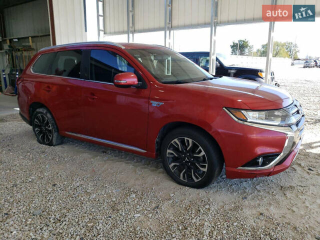 Красный Мицубиси Аутлендер, объемом двигателя 2 л и пробегом 226 тыс. км за 12500 $, фото 3 на Automoto.ua