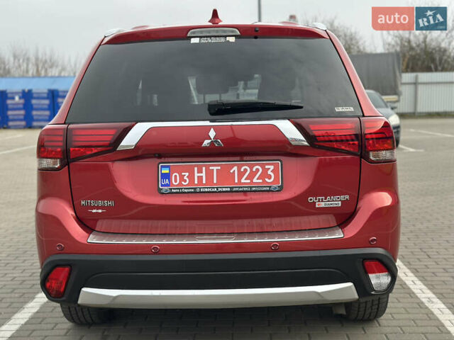 Красный Мицубиси Аутлендер, объемом двигателя 2.2 л и пробегом 118 тыс. км за 20999 $, фото 5 на Automoto.ua