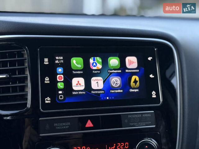 Красный Мицубиси Аутлендер, объемом двигателя 2 л и пробегом 85 тыс. км за 18900 $, фото 77 на Automoto.ua