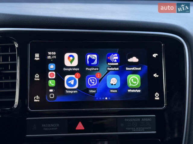 Красный Мицубиси Аутлендер, объемом двигателя 2 л и пробегом 85 тыс. км за 18900 $, фото 82 на Automoto.ua