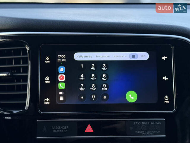 Красный Мицубиси Аутлендер, объемом двигателя 2 л и пробегом 85 тыс. км за 18900 $, фото 89 на Automoto.ua