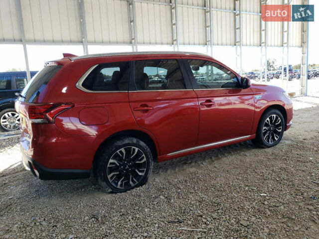 Красный Мицубиси Аутлендер, объемом двигателя 2 л и пробегом 226 тыс. км за 12500 $, фото 2 на Automoto.ua