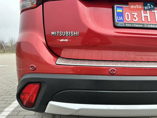 Красный Мицубиси Аутлендер, объемом двигателя 2.2 л и пробегом 118 тыс. км за 20999 $, фото 27 на Automoto.ua