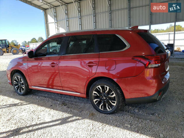 Красный Мицубиси Аутлендер, объемом двигателя 2 л и пробегом 226 тыс. км за 12500 $, фото 1 на Automoto.ua