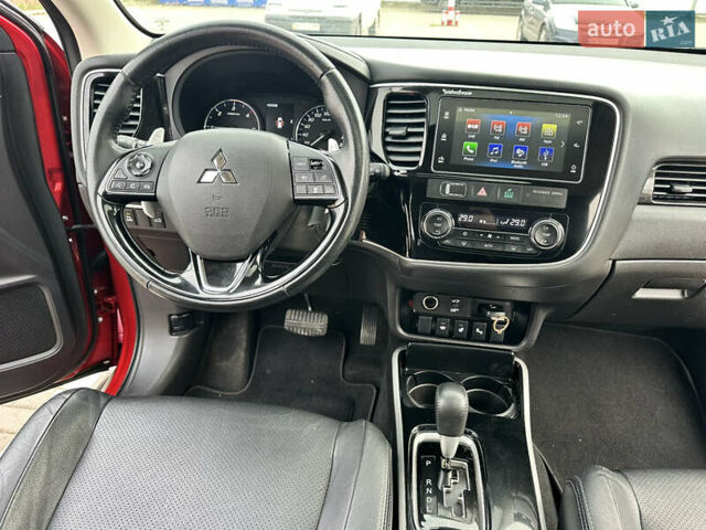Красный Мицубиси Аутлендер, объемом двигателя 2.2 л и пробегом 118 тыс. км за 20999 $, фото 62 на Automoto.ua