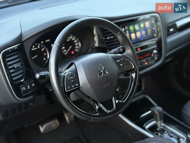 Красный Мицубиси Аутлендер, объемом двигателя 2 л и пробегом 85 тыс. км за 18900 $, фото 70 на Automoto.ua