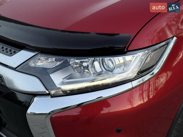 Красный Мицубиси Аутлендер, объемом двигателя 2 л и пробегом 85 тыс. км за 18900 $, фото 18 на Automoto.ua