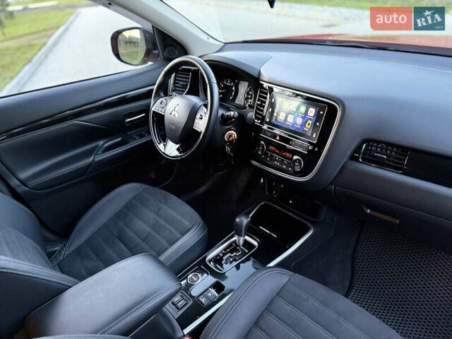 Красный Мицубиси Аутлендер, объемом двигателя 2 л и пробегом 85 тыс. км за 18900 $, фото 23 на Automoto.ua