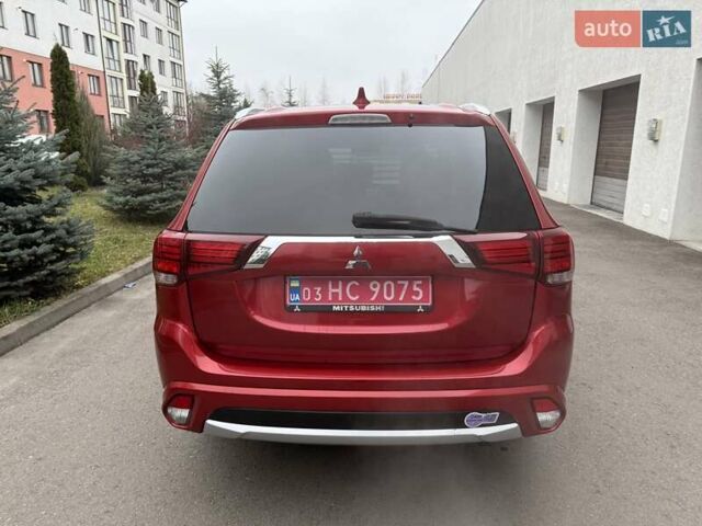 Красный Мицубиси Аутлендер, объемом двигателя 2 л и пробегом 176 тыс. км за 18900 $, фото 5 на Automoto.ua